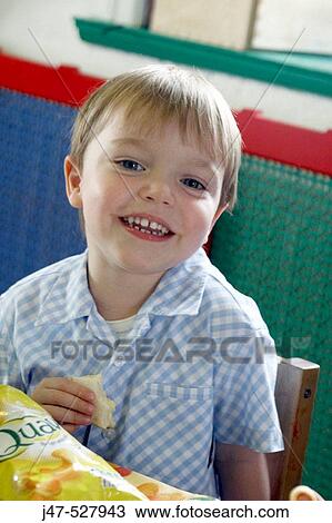3 year old boy, looking into camera, at nursery, smiling View Large Photo Image Stock Image - 3 year old boy, looking into camera, at nursery, smiling. Fotosearch