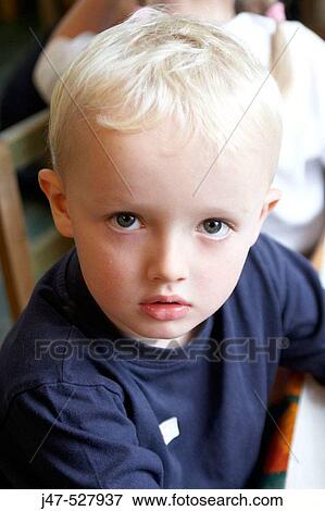 3 year old boy, looking into camera, at nursery View Large Photo Image Stock Photo - 3 year old boy, looking into camera, at nursery. Fotosearch