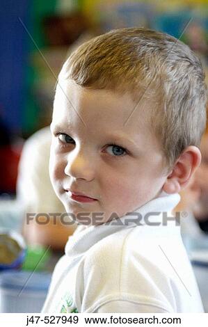 3 year old boy, looking into camera, at nursery, View Large Photo Image Stock Photo - 3 year old boy, looking into camera, at nursery,. Fotosearch