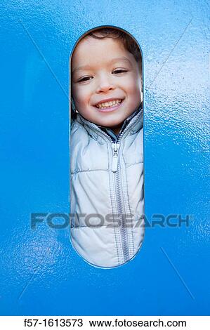 3 year old boy playing in a playground View Large Photo Image Stock Image - 3 year old boy playing in a playground. Fotosearch