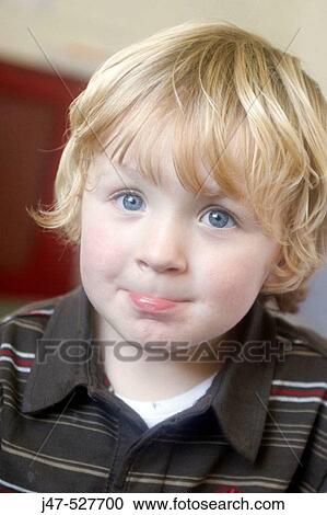 3 year old boy smiling into camera at nursery View Large Photo Image Stock Image - 3 year old boy smiling into camera at nursery. Fotosearch