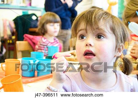 3 year old girl at a party, looking off camera View Large Photo Image Stock Image - 3 year old girl at a party, looking off camera. Fotosearch