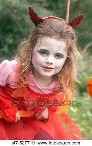 3 year old girl dressed up in a red devils costume View Large Photo Image Stock Photo - 3 year old girl dressed up in a red devils costume. Fotosearch