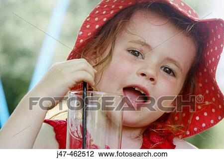 3 year old girl in a big floppy red hat, drinking, smiling at camera View Large Photo Image Stock Image - 3 year old girl in a big floppy red hat, drinking, smiling at camera. Fotosearch