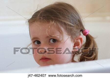 3 year old girl in the bath looking very seriously into the camera View Large Photo Image Stock Photo - 3 year old girl in the bath looking very seriously into the camera. Fotosearch