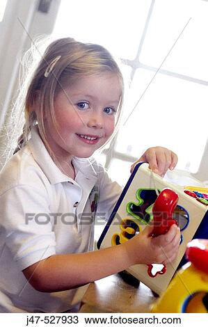 3 year old girl, looking into camera, at nursery, smiling View Large Photo Image Stock Image - 3 year old girl, looking into camera, at nursery, smiling. Fotosearch