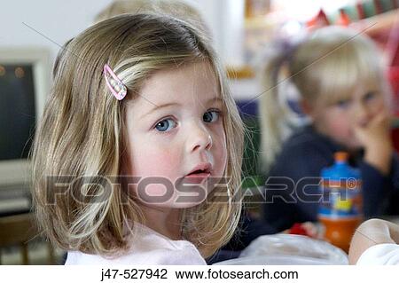 3 year old girl, looking into camera, at nursery, serious, View Large Photo Image Stock Image - 3 year old girl, looking into camera, at nursery, serious,. Fotosearch