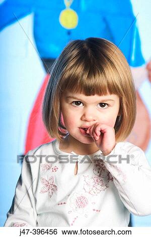3 year old girl looking into camera, thumb in her mouth View Large Photo Image Stock Photograph - 3 year old girl looking into camera, thumb in her mouth. Fotosearch