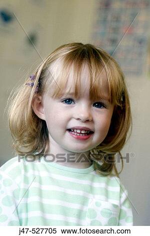 3 year old girl smiling into camera at nursery View Large Photo Image Stock Photography - 3 year old girl smiling into camera at nursery. Fotosearch
