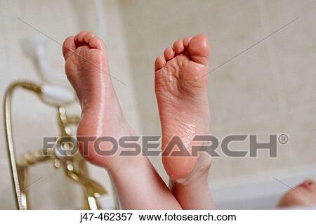 3 year old girls feet on the side of a bathtub View Large Photo Image Stock Photo - 3 year old girls feet on the side of a bathtub. Fotosearch