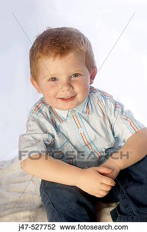 3 year old, red haired boy smiling into camera View Large Photo Image Stock Image - 3 year old, red haired boy smiling into camera. Fotosearch