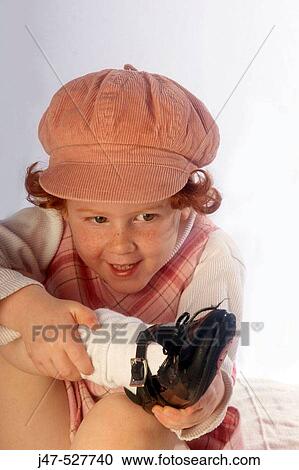 3 year old, red haired girl smiling into camera laughing, holding her foot View Large Photo Image Stock Image - 3 year old, red haired girl smiling into camera laughing, holding her foot. Fotosearch