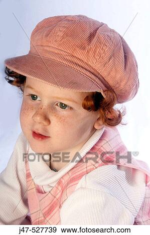3 year old, red haired girl wearing a hat, gazing off camera View Large Photo Image Stock Photo - 3 year old, red haired girl wearing a hat, gazing off camera. Fotosearch