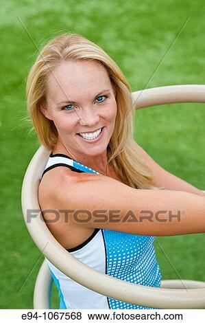 30 year old blonde woman in work out clothes exercising View Large Photo Image Stock Photo - 30 year old blonde woman in work out clothes exercising. Fotosearch