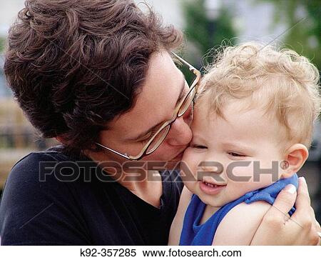 Stock Photography - 30 year old mother and her one year old son. Fotosearch