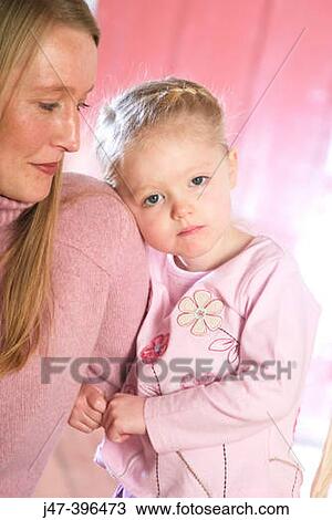 30 year old mother with her 3 year old daughter clinging onto her arm looking into camera View Large Photo Image Stock Image - 30 year old mother with her 3 year old daughter clinging onto her arm looking into camera. Fotosearch