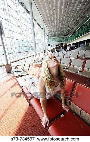 Stock Photo - 30 year old woman doing yoga. Fotosearch