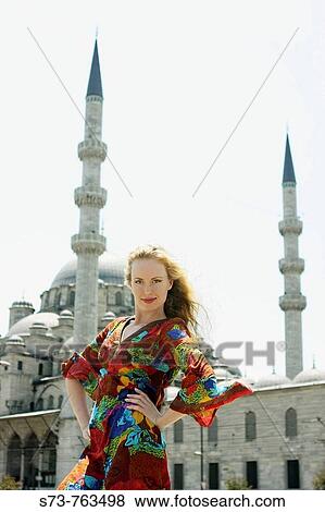 Stock Photo - 30 year old woman in front of Blue Mosque, Istanbul. Turkey. Fotosearch