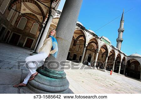 Stock Image - 30 year old woman in the Blue Mosque, Istanbul. Turkey. Fotosearch