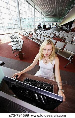 30 year old woman using computer View Large Photo Image Stock Photo - 30 year old woman using computer. Fotosearch