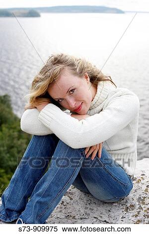 30 years old woman in a relaxed position in Maladieski Kurdan Natural Park in Toglyatty, Samara Region, Russian Federation, Russia View Large Photo Image Stock Photography - 30 years old woman in a relaxed position in Maladieski Kurdan Natural Park in Toglyatty, Samara Region, Russian Federation, Russia. Fotosearch