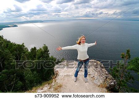 30 years old woman jumping in Molodeskiy Kurgan National Park in Toglyatty, Samara Region, Russian Federation, Russia View Large Photo Image Stock Image - 30 years old woman jumping in Molodeskiy Kurgan National Park in Toglyatty, Samara Region, Russian Federation, Russia. Fotosearch