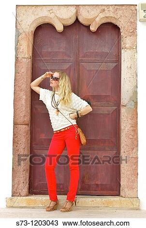 30 years old woman posing in a door in Carvoeiro, Algarve, Portugal View Large Photo Image Stock Image - 30 years old woman posing in a door in Carvoeiro, Algarve, Portugal. Fotosearch