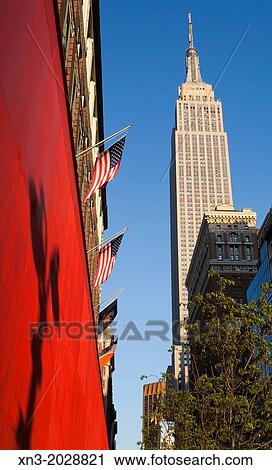 34th street, on background Empire State Building, Midtown, Manhattan, New York, New York City, United States, USA. View Large Photo Image Stock Image - 34th street, on background Empire State Building, Midtown, Manhattan, New York, New York City, United States, USA.. Fotosearch