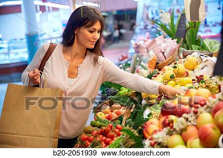 35 year old woman buying fruit. Shopping at the Bretxa Market. Donostia. San Sebastian. Gipuzkoa. Basque Country. Spain. View Large Photo Image Stock Photo - 35 year old woman buying fruit. Shopping at the Bretxa Market. Donostia. San Sebastian. Gipuzkoa. Basque Country. Spain.. Fotosearch