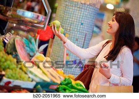 35 year old woman buying fruit. Shopping at the Bretxa Market. Donostia. San Sebastian. Gipuzkoa. Basque Country. Spain. View Large Photo Image Stock Photography - 35 year old woman buying fruit. Shopping at the Bretxa Market. Donostia. San Sebastian. Gipuzkoa. Basque Country. Spain.. Fotosearch