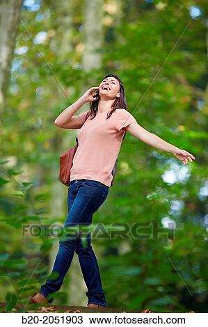 35 year old woman in park talking with smartphone. Donostia. San Sebastian. Gipuzkoa. Basque Country- Spain. View Large Photo Image Stock Image - 35 year old woman in park talking with smartphone. Donostia. San Sebastian. Gipuzkoa. Basque Country- Spain.. Fotosearch