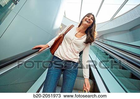 35 year old woman on escalators. Shopping at the Bretxa Market. Donostia. San Sebastian. Gipuzkoa. Basque Country. Spain. View Large Photo Image Stock Image - 35 year old woman on escalators. Shopping at the Bretxa Market. Donostia. San Sebastian. Gipuzkoa. Basque Country. Spain.. Fotosearch