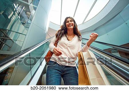 35 year old woman on escalators. Shopping at the Bretxa Market. Donostia. San Sebastian. Gipuzkoa. Basque Country. Spain. View Large Photo Image Stock Image - 35 year old woman on escalators. Shopping at the Bretxa Market. Donostia. San Sebastian. Gipuzkoa. Basque Country. Spain.. Fotosearch