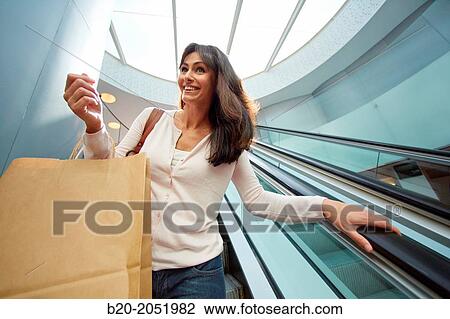 35 year old woman on escalators. Shopping at the Bretxa Market. Donostia. San Sebastian. Gipuzkoa. Basque Country. Spain. View Large Photo Image Stock Image - 35 year old woman on escalators. Shopping at the Bretxa Market. Donostia. San Sebastian. Gipuzkoa. Basque Country. Spain.. Fotosearch