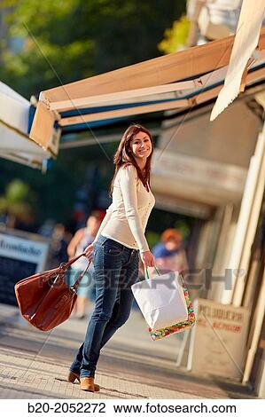 35 year old woman shopping on the street. Donostia. San Sebastian. Gipuzkoa. Basque Country. Spain. View Large Photo Image Stock Image - 35 year old woman shopping on the street. Donostia. San Sebastian. Gipuzkoa. Basque Country. Spain.. Fotosearch