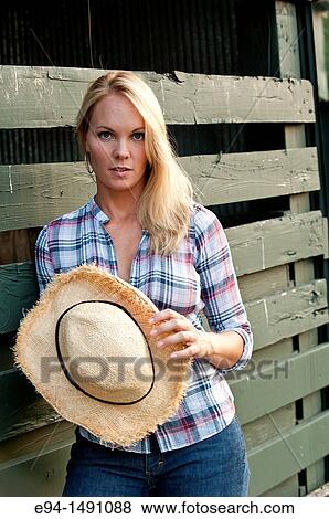 35 year old woman year, beauty, blonde, blue jeans, casual, country, farm, female, fitness, health, lifestyle, straw hat, woman View Large Photo Image Stock Photo - 35 year old woman year, beauty, blonde, blue jeans, casual, country, farm, female, fitness, health, lifestyle, straw hat, woman. Fotosearch
