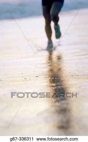 35 years old woman running on beach. California. USA. View Large Photo Image Stock Image - 35 years old woman running on beach. California. USA.. Fotosearch