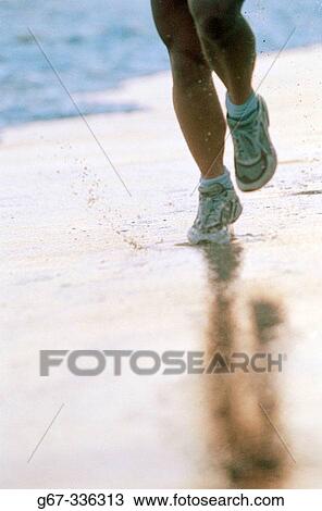35 years old woman running on beach. California. USA. View Large Photo Image Stock Image - 35 years old woman running on beach. California. USA.. Fotosearch