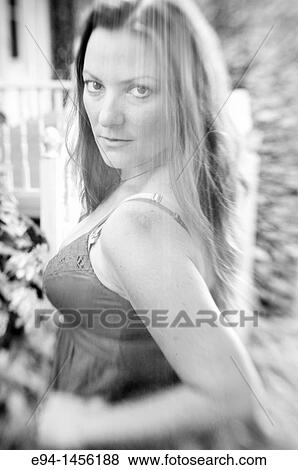 36 six year old brunette woman in a summer dress looking directing at camera View Large Photo Image Stock Photo - 36 six year old brunette woman in a summer dress looking directing at camera. Fotosearch