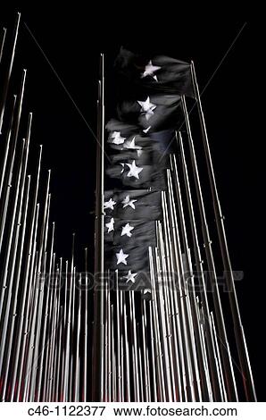 38 huge black flags bearing a white star in front of the U S diplomatic mission in Havana to mourn for the victims of the 1961 Bay of Pigs invasion. El Malec? n. Havana. Cuba. View Large Photo Image Stock Photo - 38 huge black flags bearing a white star in front of the U S diplomatic mission in Havana to mourn for the victims of the 1961 Bay of Pigs invasion. El Malec? n. Havana. Cuba.. Fotosearch
