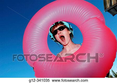 39 year old woman holding pink tube View Large Photo Image Stock Photography - 39 year old woman holding pink tube. Fotosearch