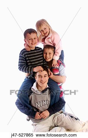4 brothers and sisters, aged 3 to 15 on each others shoulders smiling into camera View Large Photo Image Stock Photography - 4 brothers and sisters, aged 3 to 15 on each others shoulders smiling into camera. Fotosearch