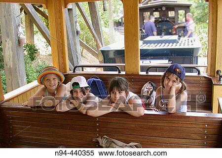 4 girls between 8 and 10 years with a trip by train in the Port Aventura theme park in Tarragona. Catalunya, Spain. View Large Photo Image Stock Photography - 4 girls between 8 and 10 years with a trip by train in the Port Aventura theme park in Tarragona. Catalunya, Spain.. Fotosearch