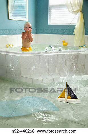 4 year old boy overflowing bathtub. View Large Photo Image Stock Photo - 4 year old boy overflowing bathtub.. Fotosearch