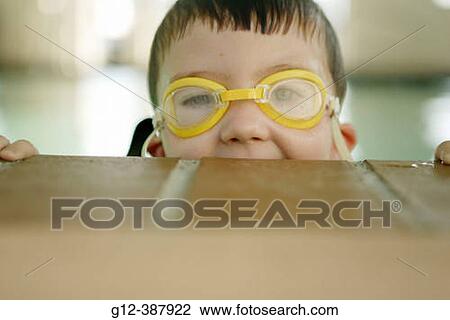 4 year old boy playing in pool View Large Photo Image Stock Image - 4 year old boy playing in pool. Fotosearch