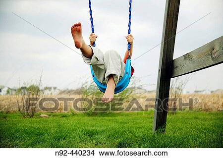 Picture - 4 year old boy shot near dusk in October.. Fotosearch