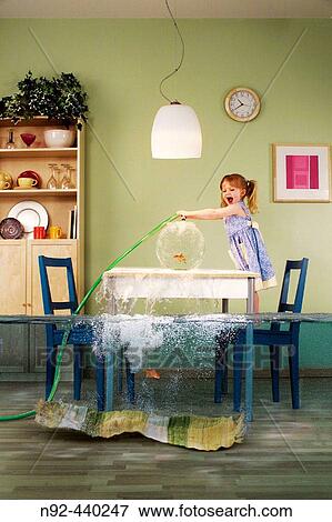 4 year old filling fish bowl with too much water. View Large Photo Image Stock Photo - 4 year old filling fish bowl with too much water.. Fotosearch