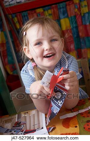 4 year old girl at nursery, smiling into camera, cutting View Large Photo Image Picture - 4 year old girl at nursery, smiling into camera, cutting. Fotosearch