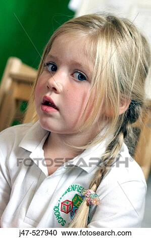 4 year old girl at nursery, smiling into camera, wearing her uniform View Large Photo Image Stock Image - 4 year old girl at nursery, smiling into camera, wearing her uniform. Fotosearch