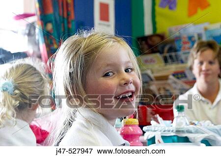 4 year old girl at nursery, smiling into camera View Large Photo Image Stock Photo - 4 year old girl at nursery, smiling into camera. Fotosearch